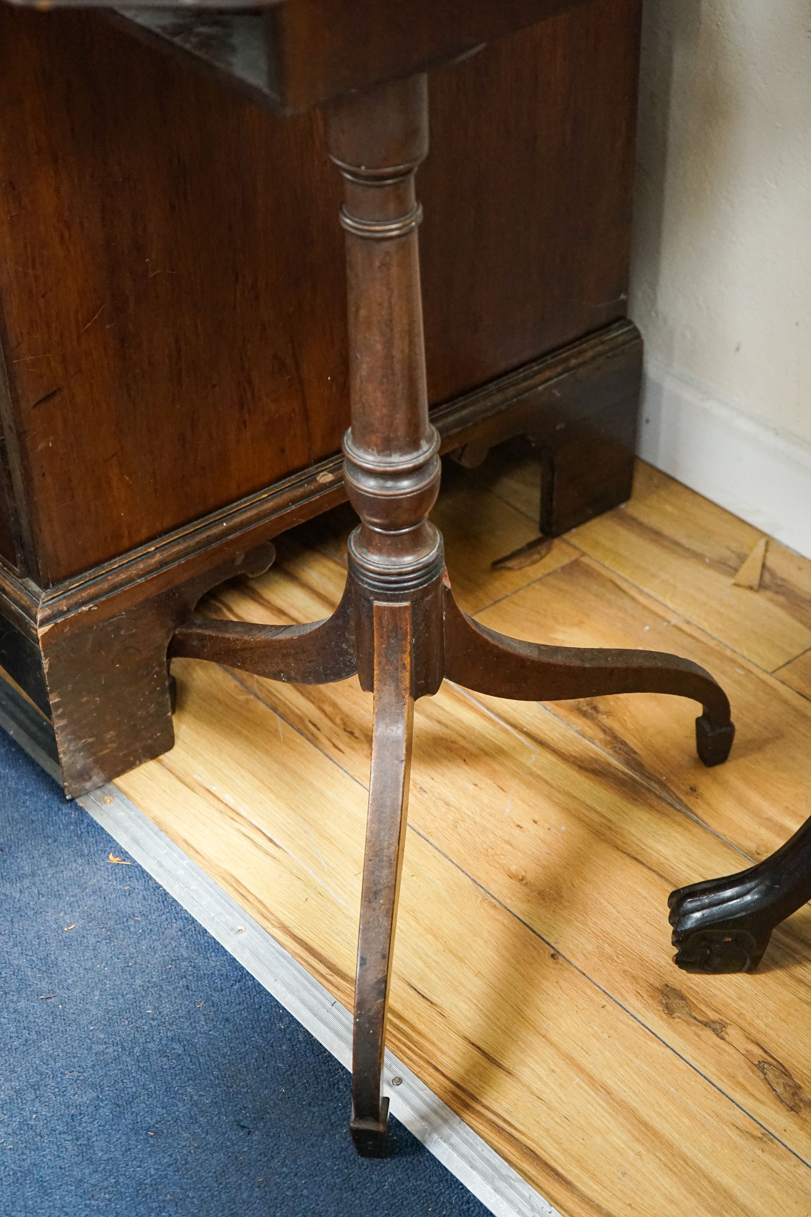 A 19th century mahogany octagonal tilt-top occasional table, the octagonal top on turned column and tripartie base, width 51cm, depth 38cm, height 74cm